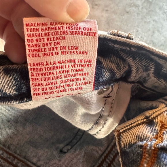 Revice size 25 crossover/asymmetrical waist denim jeans. Button fly, acid wash. - Picture 12 of 14